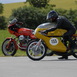 Fester Termin für Freunde klassischer Motorräder: Beim Classic Grand Prix auf dem Schleizer Dreieck starten Old- und Youngtimer in vielen verschiedenen Klassen - mit von der Partie beim tradionsreichen Treffen sind auch Rennen der IHRO, der offenen Serie "Grab the Flag" und Seitenwagen-Rennen. --- Regular date for friends of classic bikes: At the Classic Grand Prix on Schleizer Dreieck old- and youngtimers are starting in several classes - an traditional meeting in midyear, complemented by series of IHRO and "Grab the Flag" and sidecar-races.